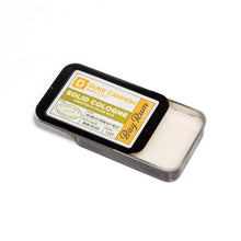 Load image into Gallery viewer, Duke Cannon Supply Co. Solid Cologne for Men Bay Rum (Citrus Musk, Cedarwood, Island Spice) - Concentrated Balm, Travel-Friendly Convenient Tin, Made with Natural & Organic Ingredients 1.5 oz (1 unit)