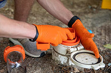 Load image into Gallery viewer, Camco RhinoFLEX 6-in-1 Sewer Cleanout Plug Wrench with Easy Grip Handle- Easily Loosen Any RV Dump Station Cap with Universal Design, 3" or 4" Male and Female Sewer Cleanout Plugs (39755) , Orange