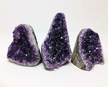 Load image into Gallery viewer, Extreme Polished Amethyst Cluster – Powerful deep Purple Crystals Weighing up to 1/2 lb. Geode from Uruguay. Includes Bonus 3 inch Selenite Wand in Velvet Bag.