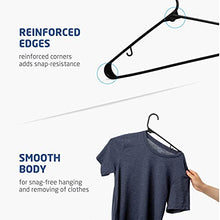 Load image into Gallery viewer, Black Standard Plastic Hangers (50 Pack) Durable Tubular Shirt Hanger Ideal for Laundry & Everyday Use, Slim & Space Saving, Heavy Duty Clothes Hanger for Coats, Pants, Dress, Etc. Hangs up to 5.5 lbs