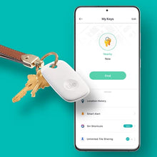 Load image into Gallery viewer, Tile Pro (2022) 2-Pack (1 Black/ 1 White). Powerful Bluetooth Tracker, Keys Finder & Item Locator for Keys, Bags & More; Up to 400 ft Range. Water-Resistant. Phone Finder. iOS and Android Compatible.
