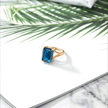 Load image into Gallery viewer, Gem Stone King London Blue Topaz 18K Yellow Gold Plated Silver Women Solitaire Ring (7.10 Cttw, Emerald Cut 14X10MM) (Size 5)