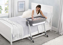 Load image into Gallery viewer, Simmons Kids By The Bed City Sleeper Bassinet - Adjustable Height Portable Crib with Wheels & Airflow Mesh, Grey Tweed
