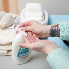Load image into Gallery viewer, Johnson's CottonTouch Newborn Baby Face and Body Lotion, Hypoallergenic Moisturization for Baby's Skin, Made with Real Cotton, Paraben-Free, Sulfate-Free, Dye-Free, 27.1 fl. oz