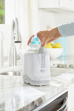 Load image into Gallery viewer, The First Years 2-in-1 Simple Serve Bottle Warmer | Quickly Warm Bottles of Breastmilk or Formula | Sanitize Pacifiers | Compact Design | Holds Wide Narrow and Angled Bottles