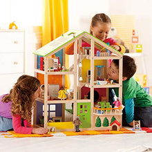Load image into Gallery viewer, All Seasons Kids Wooden Dollhouse by Hape | Award Winning 3 Story Dolls House Toy with Furniture, Accessories, Movable Stairs and Reversible Season Theme L: 23.6, W: 11.8, H: 28.9 inch