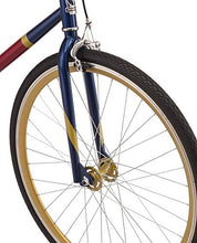 Load image into Gallery viewer, Captain Marvel Single-Speed Fixie Style Bike by Schwinn, Featuring 58cm/Large Steel Stand-Over Frame with 700C Wheels and Flip-Flop Hub, Perfect for Urban Commuting and City Riding, in Red/Blue/Gold