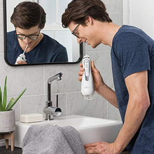 Load image into Gallery viewer, Waterpik Cordless Advanced Water Flosser For Teeth, Gums, Braces, Dental Care With Travel Bag and 4 Tips, ADA Accepted, Rechargeable, Portable, and Waterproof, White WP-560