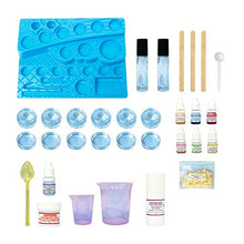Load image into Gallery viewer, Thames & Kosmos Yummy Rainbow Lip Balm Lab STEM Kit | Make Lip Balms & Glosses in a Rainbow of Colors | Includes Strawberry, Grape, Banana Flavors & Cosmetic Jars | Chemistry & Biology of Skin Care