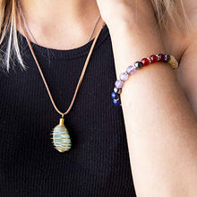 Load image into Gallery viewer, White Sage, Palo Santo Wood & Crystal Healing Kit (17Pc) ~ Smudge Stick, Palo Santo Sticks, Raw Crystals, Quartz Obelisk, 7 Chakra Stones, +Bracelet & Spiral Pendant Necklace w COA & Info Card