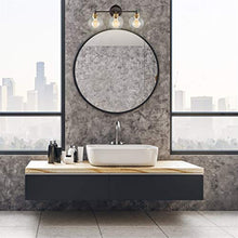 Load image into Gallery viewer, Kira Home Odette 22" Modern 3-Light Vanity/Bathroom Light + Clear Glass Globe Shades, Warm Brass Accents + Oil Rubbed Bronze Finish
