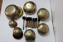 Load image into Gallery viewer, Chakra Healing Tibetan Singing Bowls Set of 7 pieces ~ Hand Hammered Himalayan Meditation Bowls ~ 5"-10" ~ included 7 Mallets, 7 cushions & 1 drum stick. Handmade in Nepal by Thamelmart