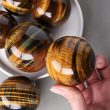 Load image into Gallery viewer, Natural Tiger Eye Healing Crystal Ball Gemstone Sphere with Wood Stand Sculpture Figurine for Reiki Divination Home Office Desk Decor (55-62mm)