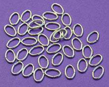Load image into Gallery viewer, New 6.5mm x 4mm 21ga 925 Sterling Silver Oval closed Jump Rings Bails 12pc