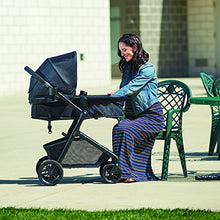 Load image into Gallery viewer, Evenflo Pivot Modular Travel System, Lightweight Baby Stroller, Sleek & Versatile, Easy Infant Car Seat Transfer, Oversized Storage Basket, Blanket Boot, Travel Stroller, 3-Panel Canopy, Sandstone Tan