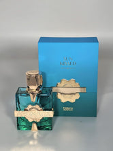 Load image into Gallery viewer, French Avenue Aromatix Sun Kissed Eau De Parfum, Woody Aromatic Unisex Fragrance, 3.4 fl oz, with Pomelo, Tea and Cedarwood Notes, Turquoise Glass Bottle with Gold Accents
