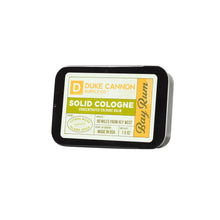 Load image into Gallery viewer, Duke Cannon Supply Co. Solid Cologne for Men Bay Rum (Citrus Musk, Cedarwood, Island Spice) - Concentrated Balm, Travel-Friendly Convenient Tin, Made with Natural &amp; Organic Ingredients 1.5 oz (1 unit)
