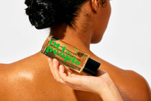 Load image into Gallery viewer, OUI the People FEATHERWEIGHT Hydrating Body Gloss CEDARWOOD - Skin Barrier Boosting Serum Oil for Deep Hydration - Softens, Firms, and Enhances Skin Health - 3.3 oz
