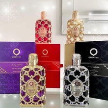 Load image into Gallery viewer, Orientica Luxury Collection Amber Rouge 4-Pc Gift Set Eau De Parfum - Woody, Amber, Saffron, Praline, Jasmine, Orange, Oak Moss, Seaweed - Arabic Perfume for Women - (2.7oz, 7.5ml &amp; 2 X 10ml spray)
