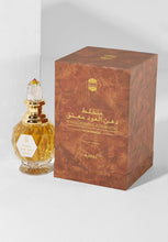 Load image into Gallery viewer, Ajmal Mukhallat DAHN AL OUDH MOATTAQ 6 ml parfum
