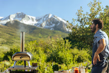 Load image into Gallery viewer, Ooni Karu 12 Multi-fuel Outdoor Portable Pizza Oven - Reaches 950°F and Cooks 12 Inch Pizzas in 60 Seconds. Versatile Wood or Propane Gas Fired Grill with Pizza Stone
