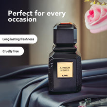 Load image into Gallery viewer, Ajmal Amber Wood Noir Eau De Parfum 3.4 Oz / 100 ML For Men &amp; Women - Long Lasting Citrus, Aromatic Fragrance - Made in Dubai

