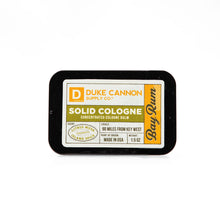 Load image into Gallery viewer, Duke Cannon Supply Co. Solid Cologne for Men Bay Rum (Citrus Musk, Cedarwood, Island Spice) - Concentrated Balm, Travel-Friendly Convenient Tin, Made with Natural &amp; Organic Ingredients 1.5 oz (1 unit)
