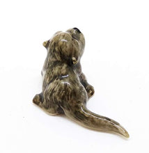 Load image into Gallery viewer, WitnyStore Sea Otter Figurines - Collectible Animal Art - Miniature Hand Made and Painted Porcelain Table Decor Perfect for Gifts and Souvenirs - 1 1/4" L x 1/2" H x 1/2" W
