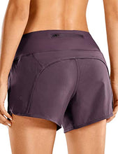 Load image into Gallery viewer, CRZ YOGA Women's Mid-Rise Quick-Dry Athletic Sports Running Workout Shorts with Zip Pocket - 4 Inches Olive Camouflage XX-Small

