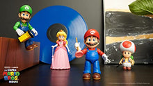 Load image into Gallery viewer, The Super Mario Bros. Movie - 5 Inch Action Figures Series 1 – Mario Figure with Plunger Accessory
