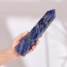Load image into Gallery viewer, AMOYSTONE 1PC Large Blue Sodalite Wand Healing Crystal Hexagonal Stone Column Natural Irregular Crystal Wand 6 Points Blue Sodalite Tower for Home Decor 1.8-2.2 Lbs
