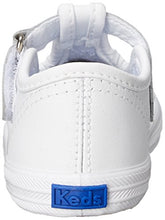 Load image into Gallery viewer, Keds baby-girls Champion Toe Cap T-Strap Sneaker , White Leather, 3 M US Infant
