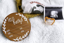 Load image into Gallery viewer, Nana's Little Angels Birth Announcement Sign 5 inch Cherry “Hello Baby” Newborn Baby Announcement Wooden Sign with White Paint Marker Wooden Disc Announcements for Hospital Pictures &amp; Photo Prop…
