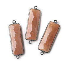 Load image into Gallery viewer, 31x11mm Black Gold Bezel Peach Moonstone Bar 2 Ring Connector North South 1 Piece
