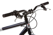 Load image into Gallery viewer, Mongoose Dolomite Fat Tire Mountain Bike, Featuring 17-Inch/Medium High-Tensile Steel Frame, 7-Speed Shimano Drivetrain, Mechanical Disc Brakes, and 26-Inch Wheels, Navy Blue
