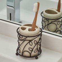 Load image into Gallery viewer, iDesign Twigz Ceramic Toothbrush Holder Stand for Bathroom, Vanity Countertops in Master, Guest, and Kids&#39; Bathrooms, 3.7&quot; x 3.7&quot; x 4.1&quot;, Vanilla and Bronze
