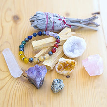 Load image into Gallery viewer, White Sage, Palo Santo Wood &amp; Crystal Healing Kit (17Pc) ~ Smudge Stick, Palo Santo Sticks, Raw Crystals, Quartz Obelisk, 7 Chakra Stones, +Bracelet &amp; Spiral Pendant Necklace w COA &amp; Info Card
