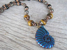 Load image into Gallery viewer, 22" Carved Pyrite Ammonite Pendant Necklace, Tiger Eye Womens Mens Jewelry, Titanium Blue, Antiqued Copper
