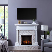 Load image into Gallery viewer, SEI Furniture Jacksdale Faux Stone Accent Electric Hidden Media Shelf Fireplace, White

