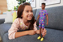 Load image into Gallery viewer, Barbie Ken Fashionistas Doll #162 with Rooted Brunette Hair Wearing Graphic Purple Top, Shorts &amp; Yellow Shoes, Toy for Kids 3 to 8 Years Old
