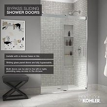 Load image into Gallery viewer, KOHLER Levity® Sliding Shower Door, 74-in H X 56-5/8 - 59-5/8-in W, with 1/4-in Thick Crystal Clear Glass with vertical blade handles, Anodized Dark Bronze

