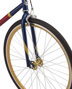 Captain Marvel Single-Speed Fixie Style Bike by Schwinn, Featuring 58cm/Large Steel Stand-Over Frame with 700C Wheels and Flip-Flop Hub, Perfect for Urban Commuting and City Riding, in Red/Blue/Gold