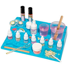 Load image into Gallery viewer, Thames &amp; Kosmos Yummy Rainbow Lip Balm Lab STEM Kit | Make Lip Balms &amp; Glosses in a Rainbow of Colors | Includes Strawberry, Grape, Banana Flavors &amp; Cosmetic Jars | Chemistry &amp; Biology of Skin Care
