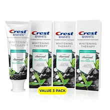 Load image into Gallery viewer, Crest Charcoal 3D White Toothpaste, Whitening Therapy, with Tea Tree Oil, Refreshing Mint flavor, 4.1 oz, Pack of 3
