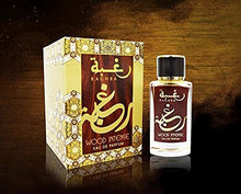 Load image into Gallery viewer, Raghba for Women EDP (Eau De Parfum) I middle eastern baked sweets in a spice market scent I Warm, cozy, and smoky Vanilla add a sweet, elegance I Long - lasting and Great Silliage I by Lattafa Perfumes (Raghba Woody Intense - 100 ML)
