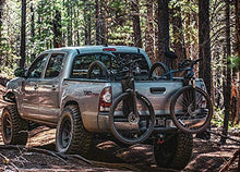 Load image into Gallery viewer, Bomber Strap (Olive Drab Transports Your Mountain Bike On Your Tailgate
